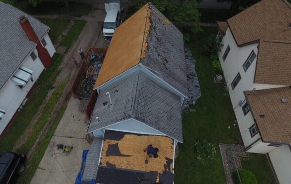 Removing damaged roof for a total roof replacement