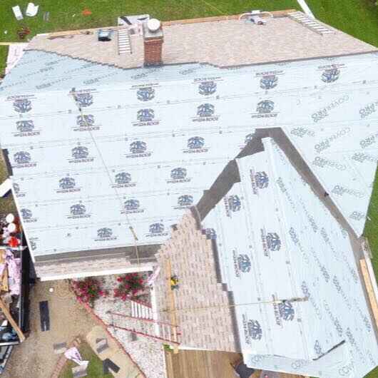 Aerial view of residential roof repair